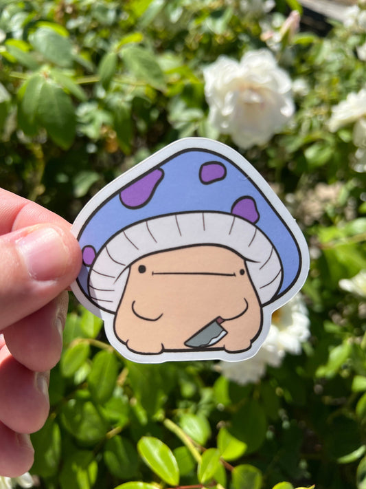 Mushroom with a knife sticker