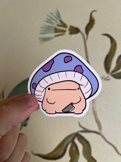 Mushroom with a knife sticker