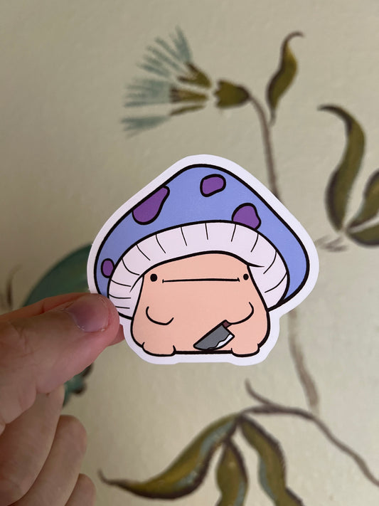 Mushroom with a knife sticker